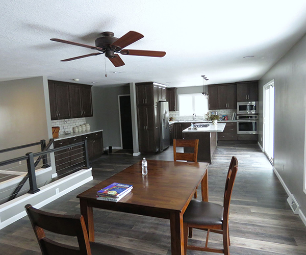 A kitchen and a dining area on the second floor