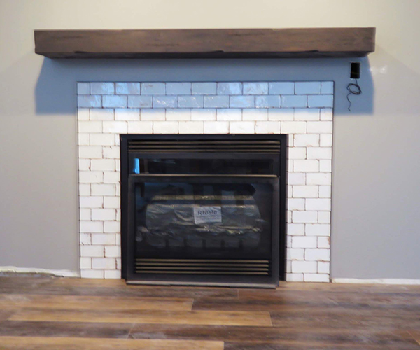 A fireplace with a cover