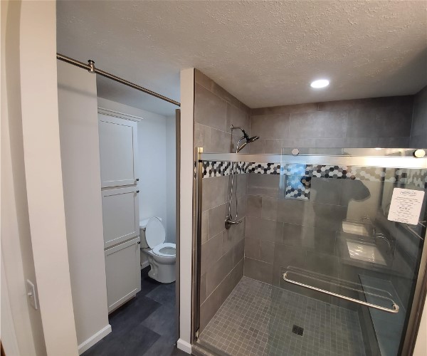 A bathroom with multiple dividers