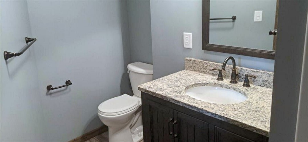 A bathroom with a small space