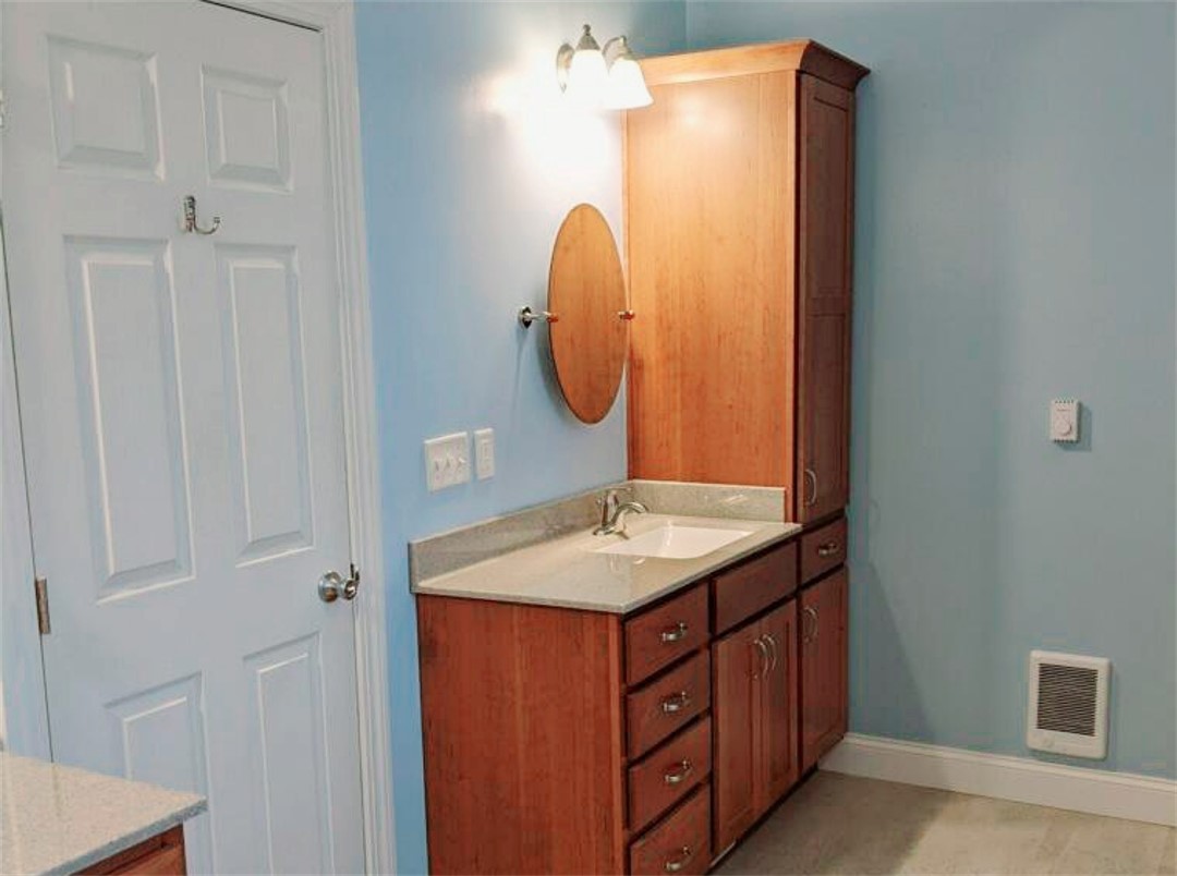 A vanity area with lights