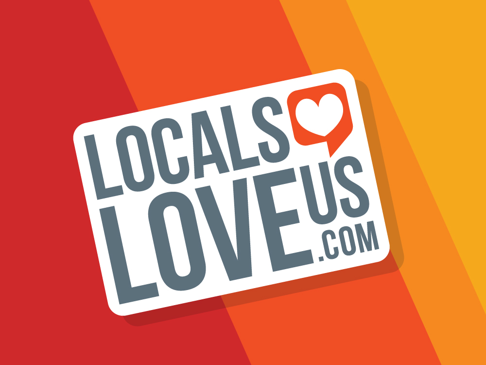 A sticker that says " locals love us ". Com."